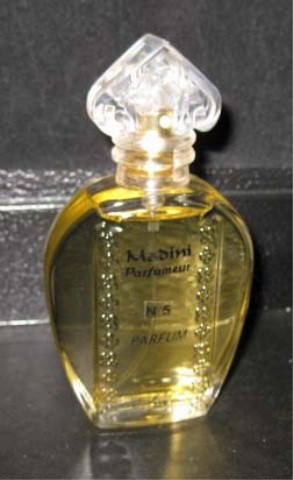 Bottle Of Madini Perfume