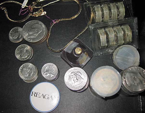 Collection of Silver Medals, Coins, etc.: 40 sterling silver medals for Delta Financing Corp. (each weighing 100 grains) 13 Susan B. Anthony dollars, 6 Eisenhower dollars, 55 JFK half dollars, 8 quarters, Reagan pin, miniature $20 gold piece,