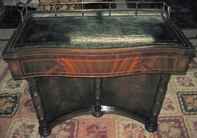 Regency Style Lift Top Dining Table (5 Leaves): tooled green leather top with brass gallery, 34 inches tall, 40 inches wide, 22 1/2 inches deep when closed