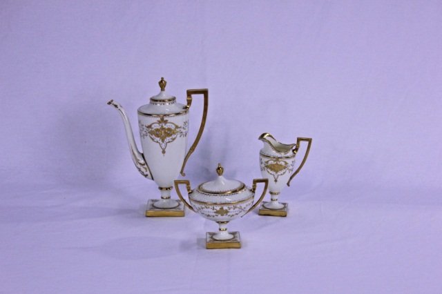 Three Piece Lenox Table Garniture: Gilt and turquoise decoration Height of tallest 11 inches Width 3 inches