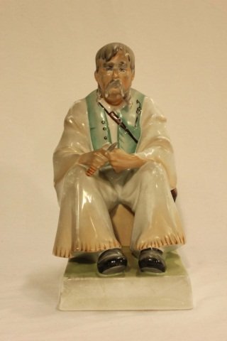 Zsolnay Porcelain Sculpture - Man with Knife: Height 14 inches