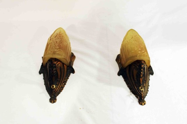 Pair Art Deco Bronze Sconces with Art Glass Shades: Height 12 inches. Antique period art deco lighting fixtures, pair of wall sconces, art glass shade with floral design and bronze mount with switch in front.