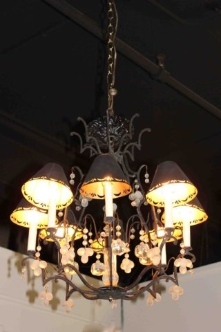 Wrought Iron Chandelier: 8 Arm Height 19 inches. Wrought iron multi arm chandelier lighting fixture with modern contemporary style ball glass crystals. Iron arms and bulb shades. Bulb shades with cut design.
