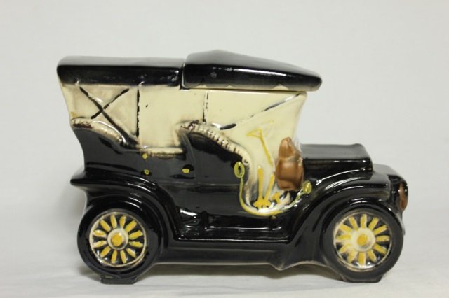 1 McCoy Cookie Jar - Antique Car: Length 10 inches Height 6.5 inches. Antique style car by McCoy USA. Vintage country kitchen decorative item.