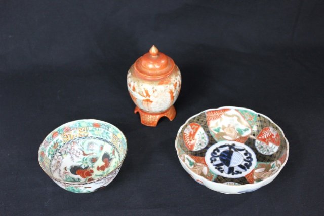 Two Chinese Bowls and Red Ginger Jar: Ginger jar has chip; Height 5 inches, diameter 6 inches. Imari style bowl, ginger jar, and bowl. One marked on underside Tenpo Period 1830 - 1843 on underside. We believe all of these are Japanese.