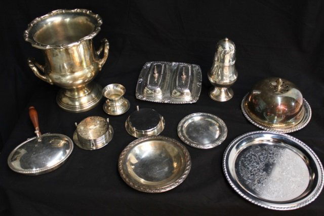 Assorted Silver Plated Articles: Including a champagne bucket, covered butter dishes. Serving plates and platters. Coasters, dome covered plate, toothpick holder, etc.