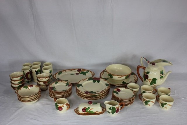 Set of Franciscan Ware China: Seven berry bowls, one large serving bowl, 5 small bowls, water pitcher with 6 tumblers, six dinner plates nine small plates, three platters, teapot, five tea cups, sugar and creamer