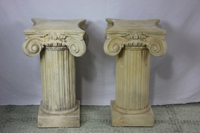 Pair of Corinthian Column Pedestal Stands: One w/ chips. Height 58 Inches Width 12 Inches Depth 12 Inches. Great for art or porcelain display. Can also be used as table bases.