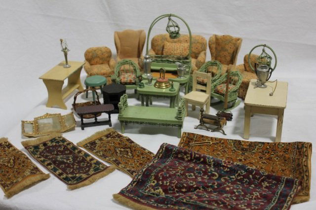 German & American Dollhouse Furniture Accessories: A set of upholstered furniture marked FAO Schwarz New York, a set of Green wicker furniture, five oriental rugs, assorted German metal accessories, Tynietoy andirons, Wisconsin Toy Company Table, Germ