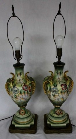 Pair of Hand Painted Urn Form Lamps on Ormolu Bases: Height of porcelain urn 20 inches. Bases are 8 by 8 inches.