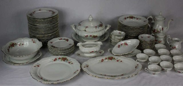 91 Piece Bavarian German Dinner & Dessert Service: 28 plates (diameter 9.5 inches), 12 bowls, 8 salad/ dessert plates, 2 serving bowls, 3 serving platters, 2 oblong serving dishes, teapot, sugar, creamer, 11 tea cups, 12 saucers, along with 8 berry bo