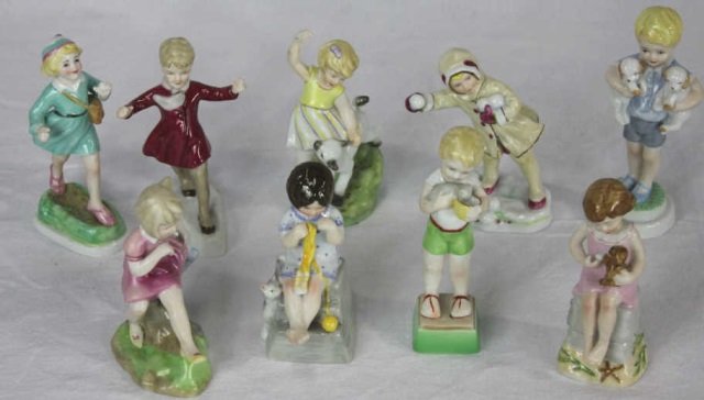 Nine Royal Worcester Figurines: Figurines depicting Months, and Days Height 5 Inches