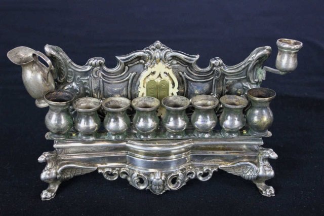 Antique Judaica Sterling Silver Menorah: Height 4.5 inches. Length 6.5 inches.