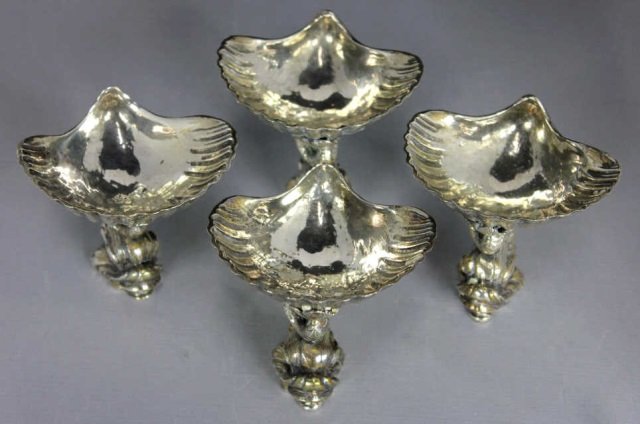 Sterling Silver Dolphin & Shell Form Salt Cellars: Four total 30 Troy Ounces Height 3 Inches Width 3.5 Inches stamped sterling, 925 & GG