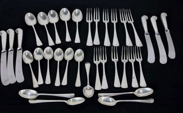 Service for Six Sterling Silver James Robinson: Six dinner forks, six dessert forks, six table spoons, 10 tea spoons, six knives. Approximately 39 ounces PLUS the knives which are sterling handles w/ stainless blades. Hallmarked for England, London
