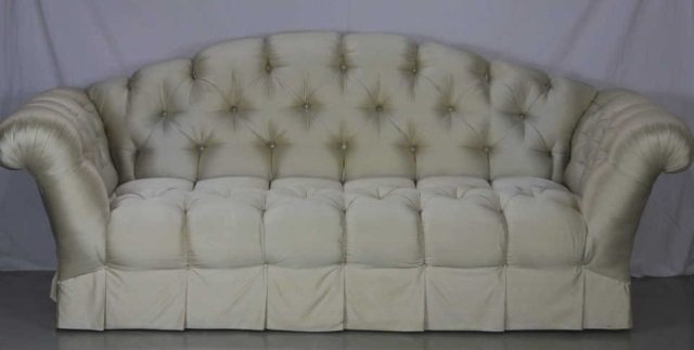 Contemporary Cream Satin Tufted Couch: (stain in middle) Height 39 Inches Length 96 Inches Depth 42 Inches