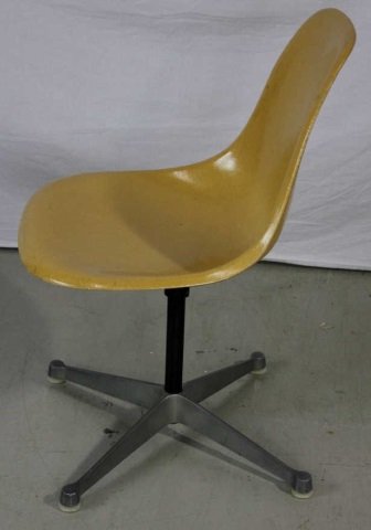 Charles Eames for Herman Miller Shell Arm Chair: Height 31 inches. Width 16 inches. Depth 16 inches.