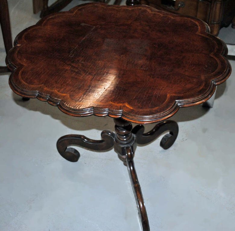 Antique Regency Tip Top Table: shaped top, 24 1/2 inches tall, 27 inches wide, 22 inches deep (tip mechanism is still in place however table does not tip)