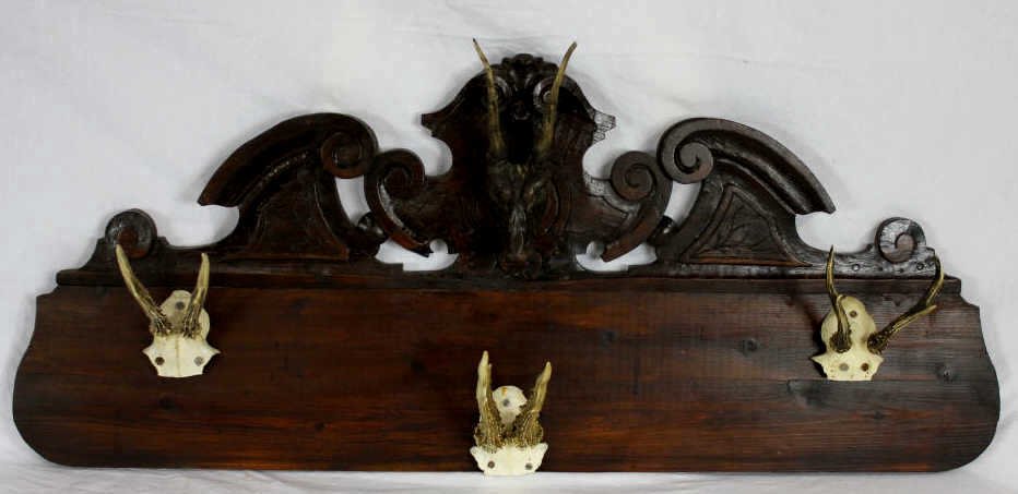 German Black Forest Carved & Antler Mount Rack: Hall rack for hats & coats. Height 19 inches Width 44 inches Depth 8 inches