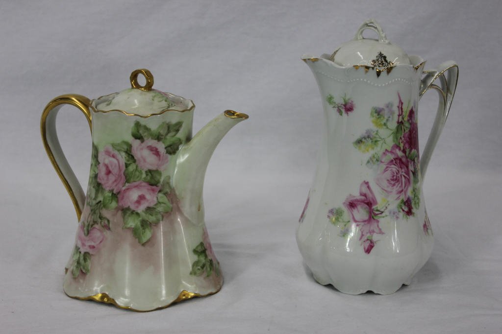Two Antique Bavarian Chocolate Pots Hand Painted: One hand painted and one decal decorated. Largest Height 9 Inches Width 7 Inches