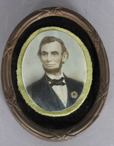 Antique Portrait Miniature of Abraham Lincoln: Set in ormolu frame w/ velvet border. Signed illegibly. Length 5.5"