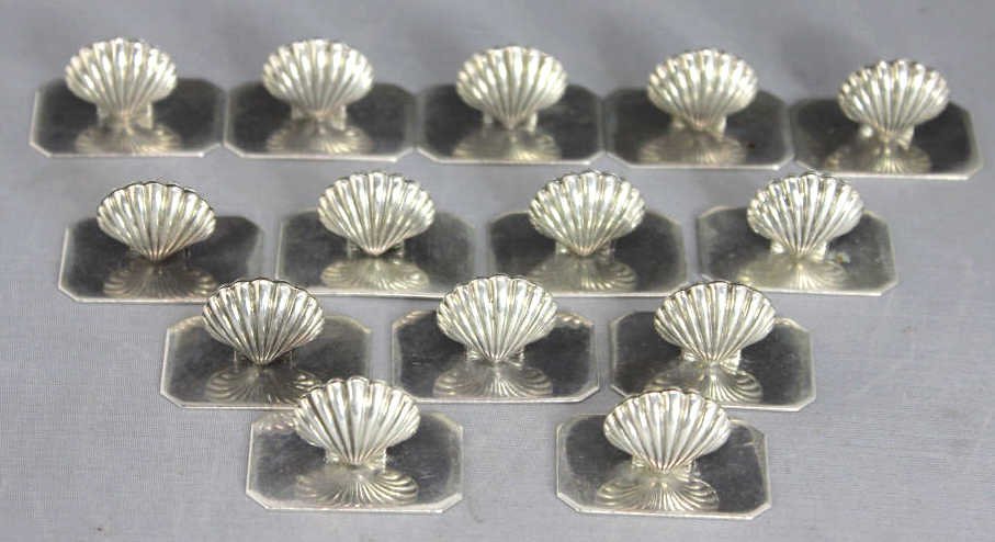 14 Sterling Silver Shell Form Name Place Holders: Property of a Scarsdale, NY Estate. Approximately 2.5 Troy Ounces