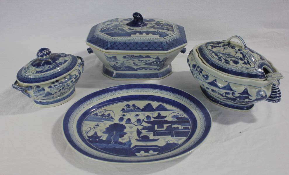 Chinese Canton Style Porcelain Serving Pieces: 3 Covered Tureens, 1 Platter, 1 Serving Ladle. Largest Tureen, Height 8 inches. Width 13 inches. Depth 9 inches.