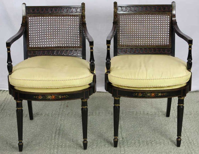 Antique Caned Hand Painted Chairs w/ Silk Cushions: Property of a Bedford NY Estate. Caned backs, silk upholstered seats and cushions. Hand painted, hand carved and gilt decorated details. Height 33 inches. Width 23 inches. Depth 21 inches.