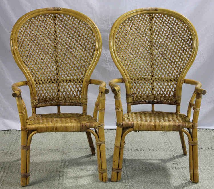 Pair Balloon Back Bamboo Wicker Arm Chairs: Height 43 inches. Width 24 inches. Depth 21 inches. Estate of Warren Dieter Zander.