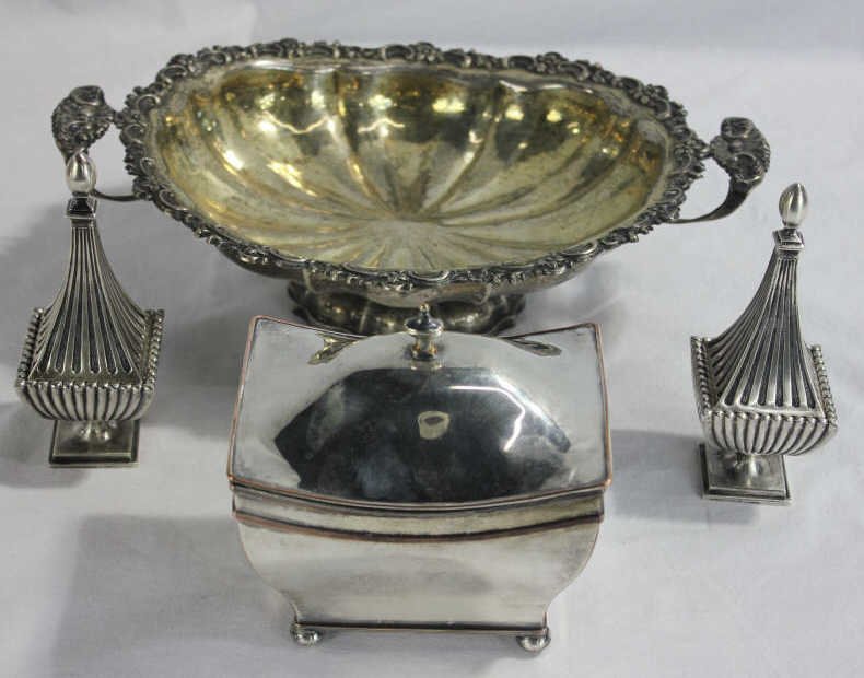 Continental Silver Plate Tea Caddy Salt Cellar Etc: Handled compote, tea caddy, pair covered salts. Height of tea caddy 5.5 inches. Height of salt cellars 6 inches. Estate of Warren Dieter Zander.