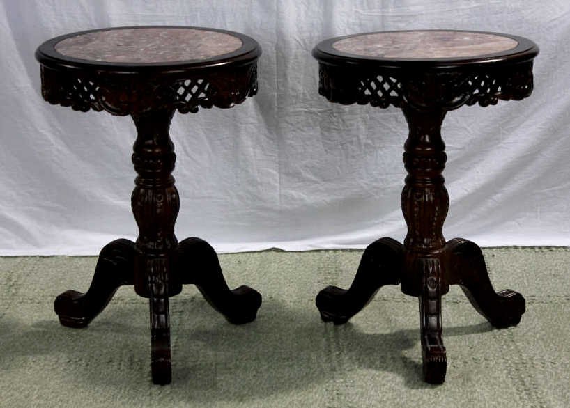 Pair Carved Mahogany & Marble Top End Tables: Property of a Monticello NY Estate. Height 29.5 inches. Diameter of top 21 inches.