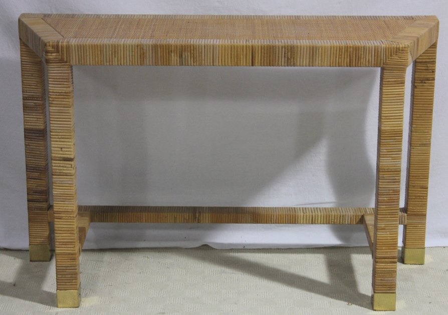 Contemporary Modern Rattan Console Table: Height 29 inches. Width 46 inches. Depth 15 inches. Estate of Warren Dieter Zander.