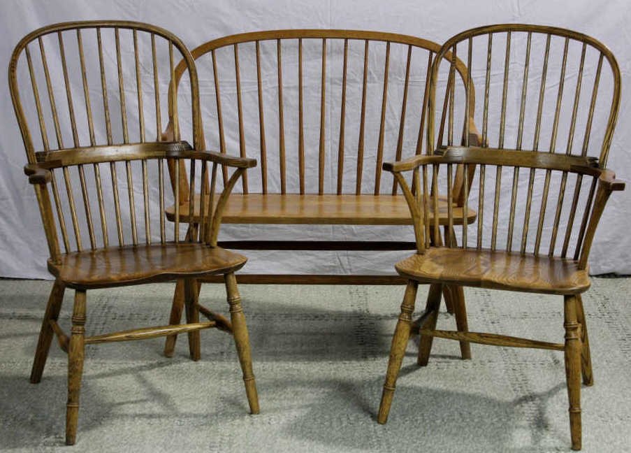 American Oak Windsor Back Bench & Arm Chairs: Property of a Bedford NY Estate. Height of Arm Chairs 41 inches. Width 25.5 inches. Depth 20 inches. Height of Bench 37.5 inches. Width 40 inches. Depth 17 inches.