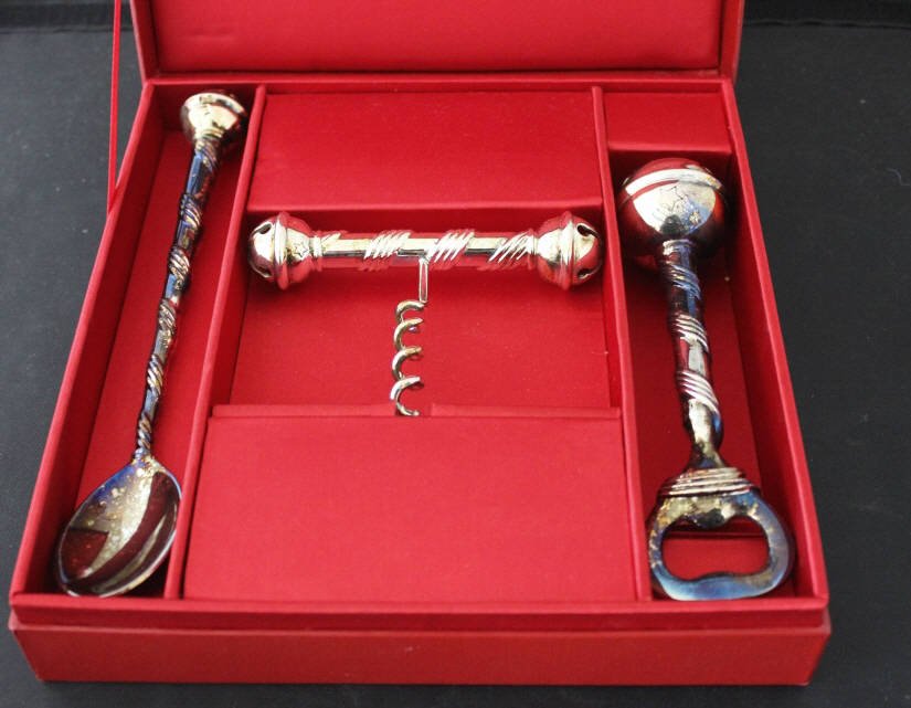 Neiman Marcus Silver Plate Cocktail Bar Tools: Mixing spoon corkscrew & bottle opener in presentation box. Box measures 8 by 8.5 inches. Property of a South Salem NY Estate.