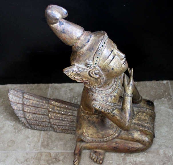 Carved Wood Buddhist God Statue: Height 20 inches. Length 20 inches. With 9 inches. Property of a Greenwich CT Estate.
