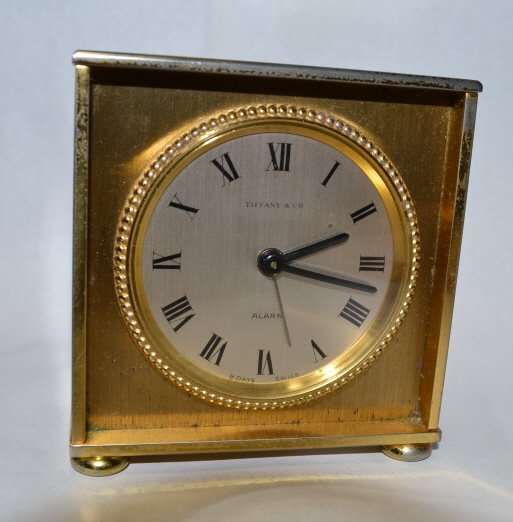 Tiffany & Co. Brass Table Top Alarm Clock.: Unknown condition. 3 x 3 inches.