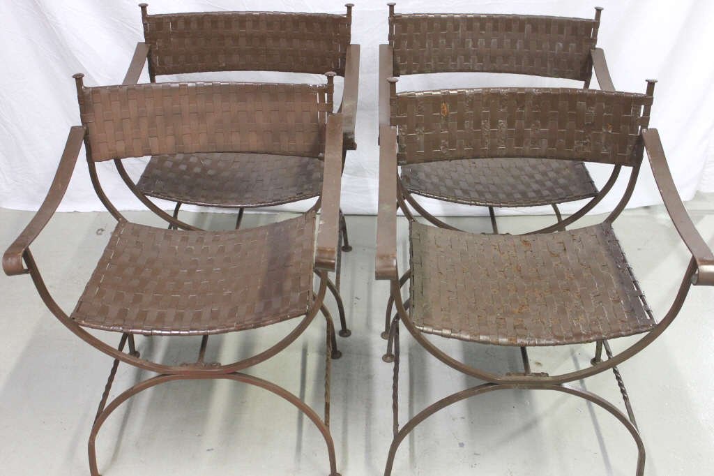 4 Contemporary Wrought Iron Patio Arm Chairs: Height 32 inches. Width 23 inches. Depth 19 inches. Property of the Gulbenkian estate Pelham NY.