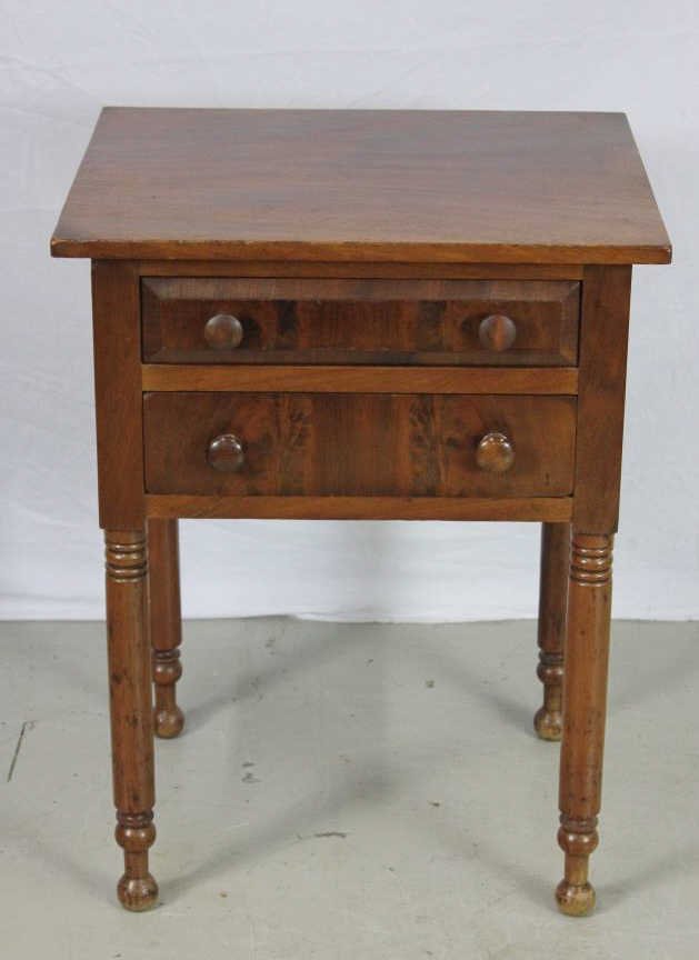 American Empire 2 Drawer Work Stand End Table: American Circa 1850. Rectangular case with 2 drawer wood pulls. Supported on 4 turned legs with ball feet. Height 29 inches. Width 22 inches. Depth 18 inches. Property of an Upper East Side Duplex.