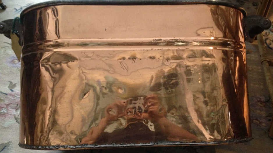 Antique Copper Wash Tub: Height 13 inches. Width 23 inches. Depth 12 inches. Property of an Upper East Side Duplex.