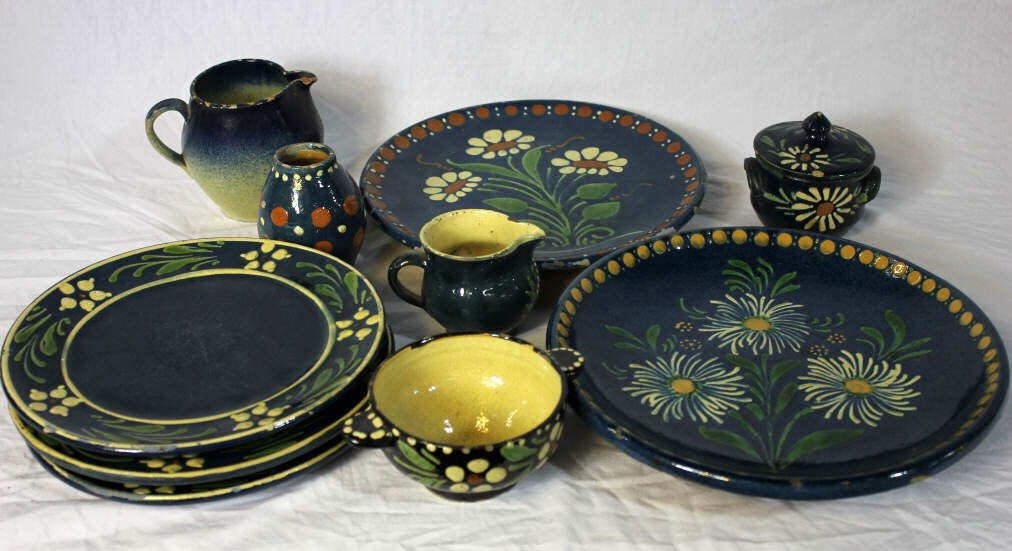 10 Pieces French Provencal Jaspe Pottery - Blue: Blue glaze w. flowers. Some 19th century including 2 chargers (diameter 12 inches) 3 plates 2 pitchers 1 vase 1 covered bowl 1 two handled bowl. Minor chips.