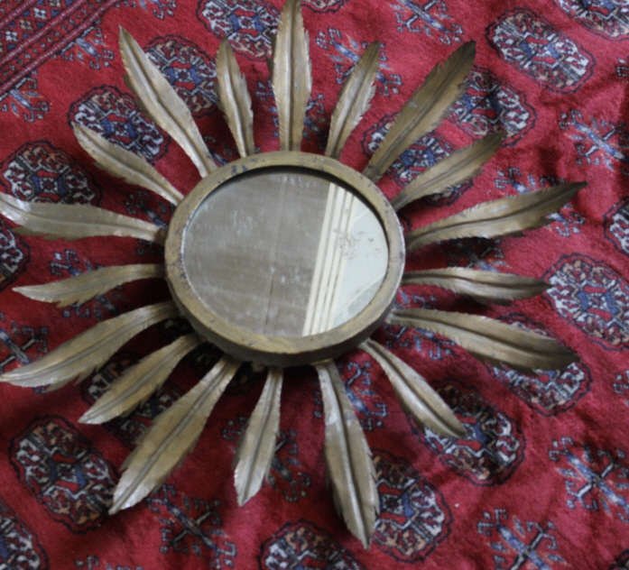 Mid Century Modern Feather Motif Mirror: Diameter 22 inches. Property of a Greenwich CT Estate.