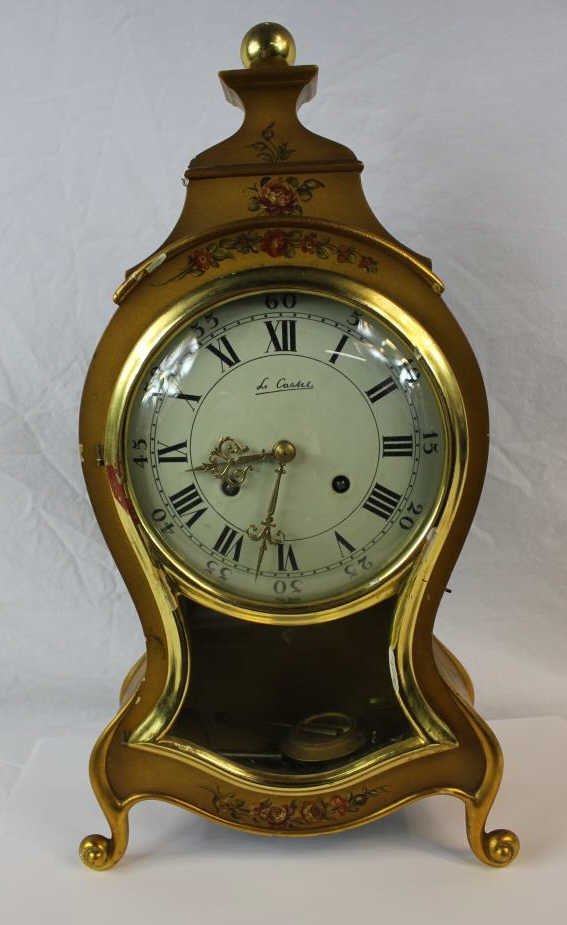 Vintage French Style Gilt Clock "Le Cassel": Gilt and gesso wood construction with floral decor. In working order Height 20.5 Inches. Width 11 Inches. Depth 4 Inches. Property of a Scarsdale NY Estate.
