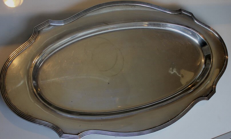 Antique Sterling Silver Gorham Serving Tray: Clearly hallmarked on back. Approximately 62 Troy Ounces. 24 inches by 12 inches. Oval form with scalloped rim. Property of a private collection same family for three generations.