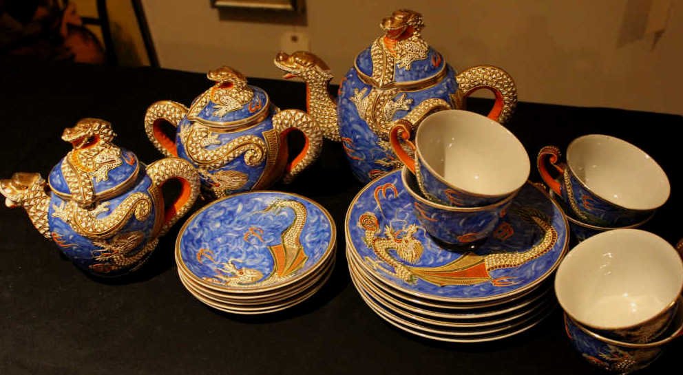 Vintage Japanese Porcelain Dragon Tea Set: 6 Cake Plate 6 Saucers 6 Teacups Teapot Sugar creamer. Height of Teapot 8 inches. Property of a Bedford NY Home.