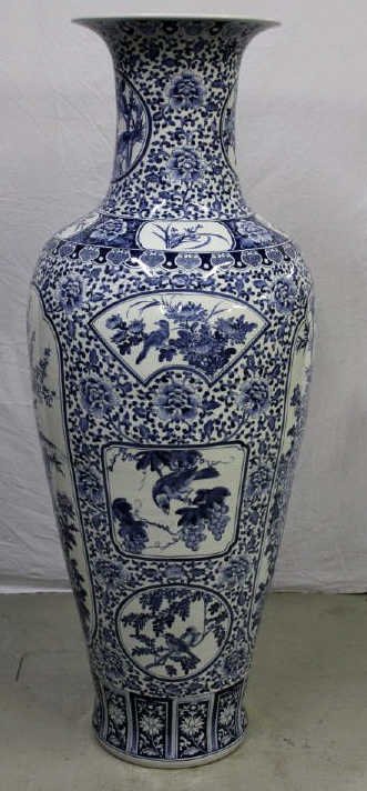 Monumental Chinese Porcelain Palace Vase: Monumental Chinese Porcelain Palace Vase Height 62 Inches Blue and White with flower and meandering scroll ground with various reserves depicting flower and bird designs. Property of an Upper East Sid