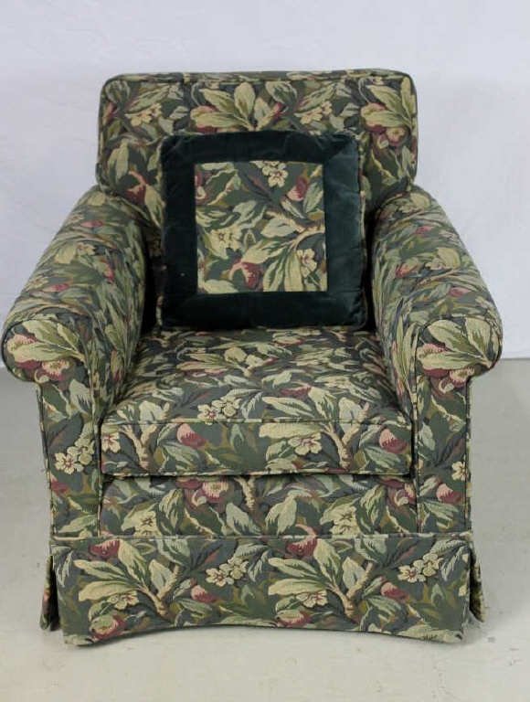 Custom Upholstered Lounge Chair: Custom Upholstered Lounge Chair All over upholstered w. pleated skirt. Matching accent pillow. Upholstery of tropical floral motif. Height 33 inches. Width 28 inches. Depth 34 inches. Property of an U