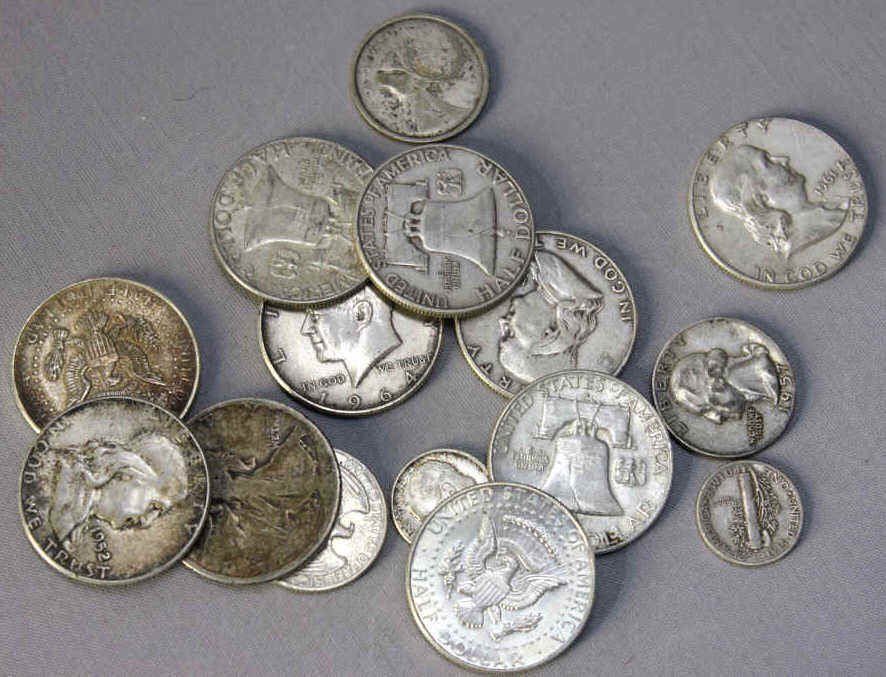 Group Assorted Ben Franklin & JFK Half Dollars: and assorted quarters Approximately 94.25 DWT