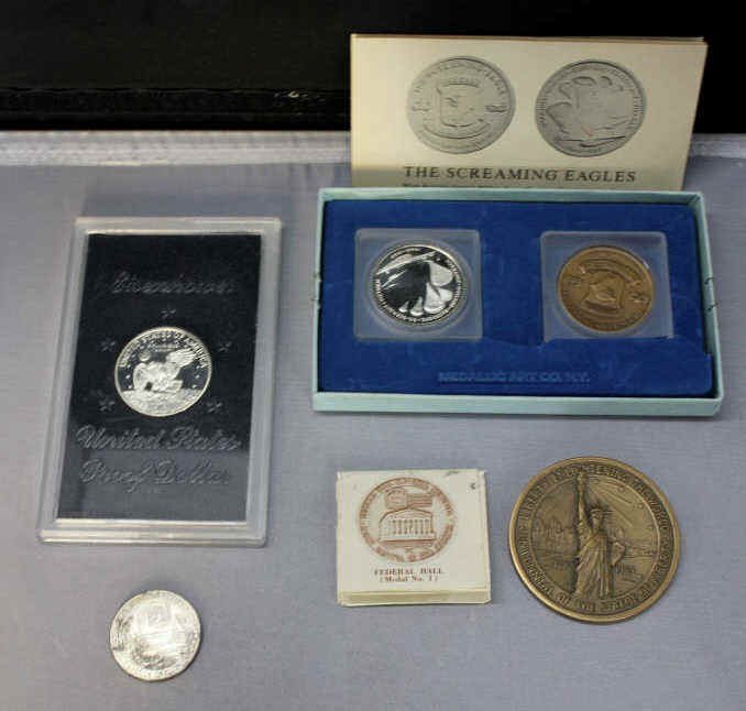 Group of Miscellaneous Coins: Federal Hall National Memorial Commemorative Coin Eisenhower Dollar Coin Centennial Liberty Coin Two Screaming Eagle Coins w/ certificate