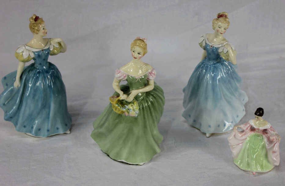 Four Royal Doulton Figurines: Two "Enchantment", one "Clarissa", and a small "Sara" designed by Peggy Davies. Largest Height 8 Inches Smallest Height 4 Inches