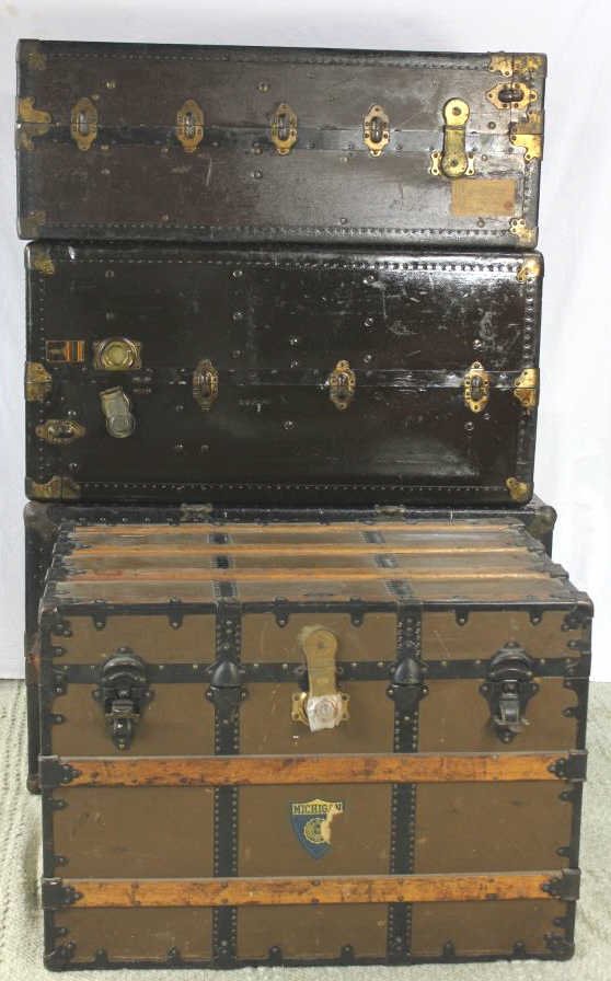 Three Antique Steamer Trunks: Largest Measures height 21 inches. Width 42 inches. Depth 22 inches